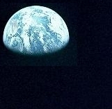 EARTHRISE IN THE MIDST OF A LUNAR DAY.
- A NASA PHOTO FROM THE APOLLO 11 MISSION.